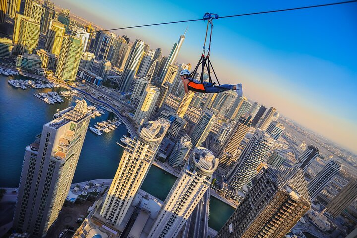 soar high above the stunning Dubai Marina taking in breathtaking views as you zipline over iconic skyscrapers and shimmering waters. An adventure for the adventurous spirit awaits!